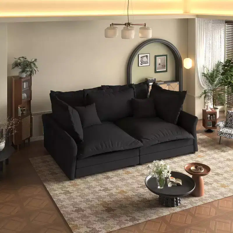 Canapé et méridienne Cloud avec plusieurs oreillers et un design luxueux pour un confort ultime