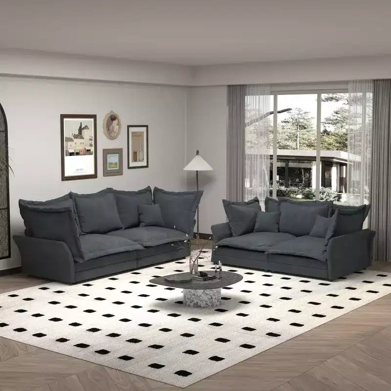 Canapé et méridienne Cloud avec plusieurs oreillers et un design luxueux pour un confort ultime