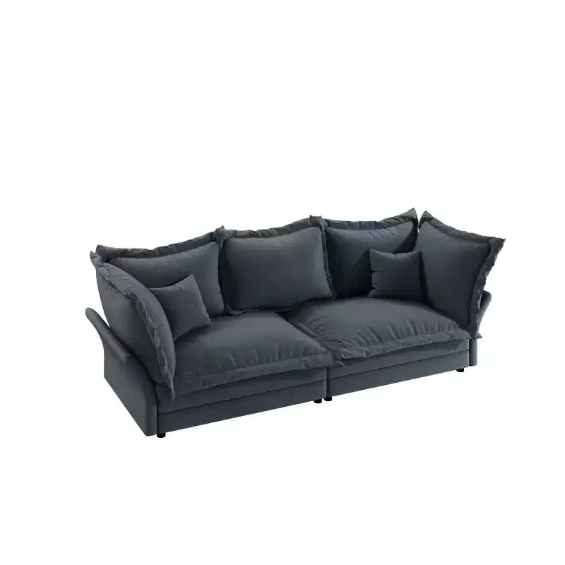 Canapé et méridienne Cloud avec plusieurs oreillers et un design luxueux pour un confort ultime