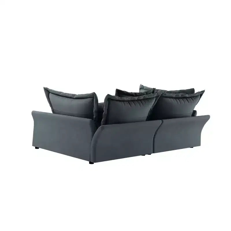 Canapé et méridienne Cloud avec plusieurs oreillers et un design luxueux pour un confort ultime